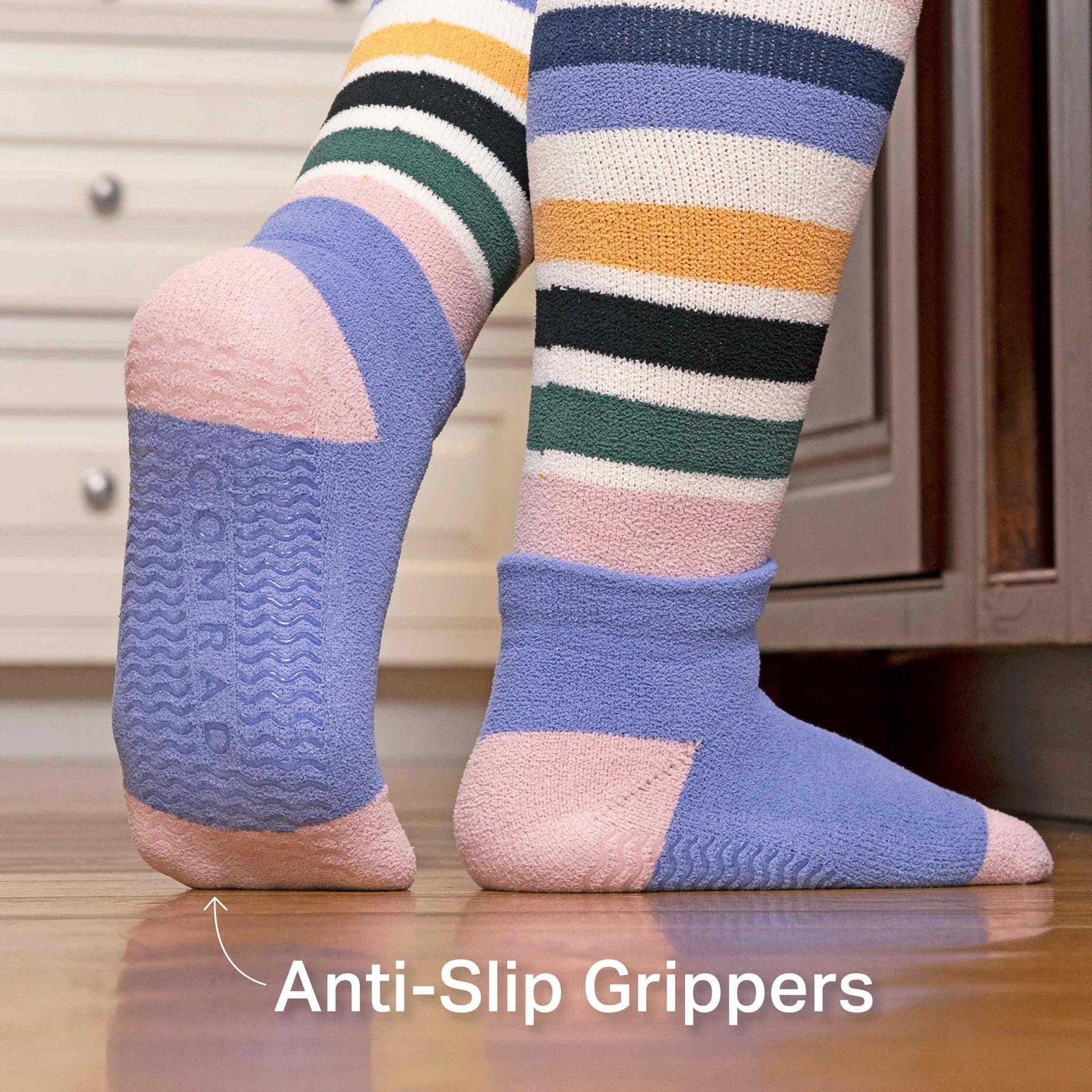 https://www.comradsocks.com/cdn/shop/files/KCS-MS-3972-L1-knee-high-cozy-poly-stripes_multi_onbody3-lil_1800x.jpg?v=1698185934